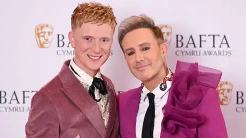 Getty Images Host Owain Wyn Evans and Ian "H" Watkins attend the 2024 BAFTA Cymru awards at the International Convention Centre Wales
