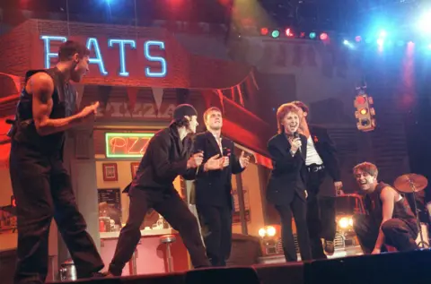 PA Media Lulu performs with Take That 