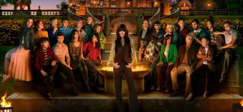 Claudia Winkleman pictured with the new Traitors contestants